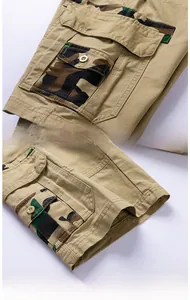 Détails du short cargo kaki montrant les poches camouflage et le tissu en coton résistant