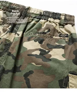 Detail of cargo shorts showing camo pattern, elastic waistband and rear pocket