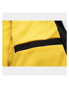 Detailed close-up of yellow breathable mesh fabric with black zipper and decorative tape