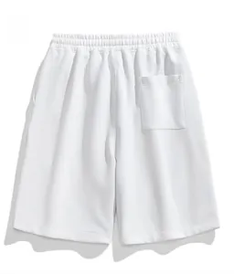 Detail view of the white waffle texture fabric and back pocket of casual shorts
