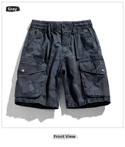Detail of grey camo cargo shorts with elastic drawstring waist and large flap pockets