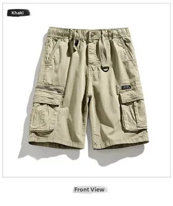 Detail of khaki cargo shorts showing elastic waist, metal button, and side flap pocket