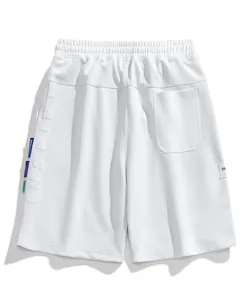Vista dettagliata posteriore dei pantaloncini sportivi bianchi con elastico in vita