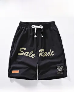 Detail of black shorts with elastic drawstring waist and stylish Sale Rade NASA prints