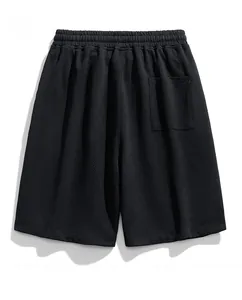 Detailed back view of men's black waffle textured shorts featuring a rear patch pocket