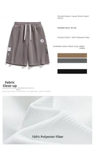 Détails du short de sport gris en 100% polyester avec cordon élastique et logo rond