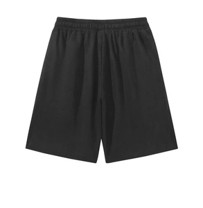 Detail of black sports shorts featuring elastic waistband and soft knitted texture