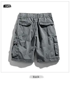 Back view of dark grey cargo shorts featuring elastic waist and large flap pockets