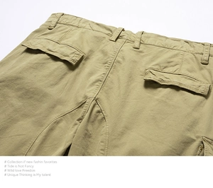 Detail shot of khaki cargo shorts with functional back pockets and cotton twill fabric