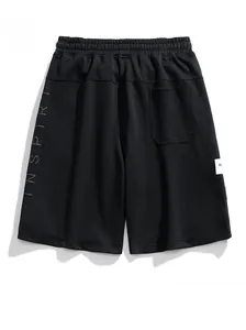 Vista posteriore di pantaloncini casual neri con vita a coulisse e stampa scritta INSPIRI