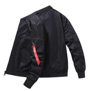 Classic black MA-1 bomber jacket with windproof nylon fabric and red utility flight tag