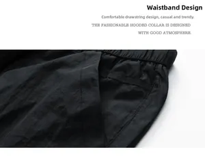 Detail view of the elastic waistband and drawstring on black quick-dry outdoor shorts