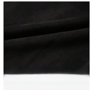 Close-up detail of soft suede-like black fabric texture and skin-friendly breathable material
