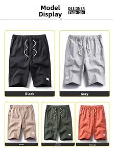 Detail view of cotton cargo shorts in black, gray, khaki, green and orange colors