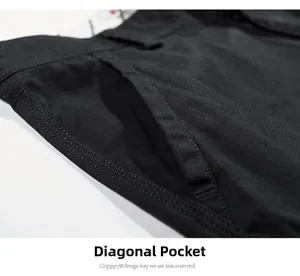 Detailed view of durable black cotton fabric with slash pockets and reinforced stitching
