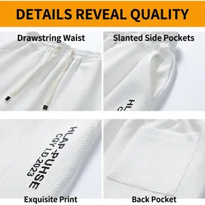 White waffle textured casual shorts for men and women featuring drawstring and side pockets