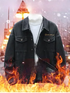 Detail of warm black denim jacket with plush lining and orange label on hem