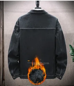 Detail view of black denim jacket with thick faux fur lining and warm thermal structure