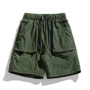 Army green quick-dry tactical cargo shorts with elastic waist and large pockets