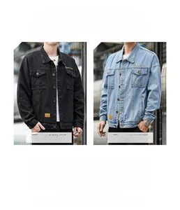 Detail of classic denim jacket in black grey and light blue with chest flap pockets