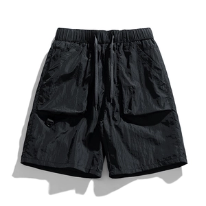 Men's black quick-dry utility shorts with drawstring waist and functional cargo pockets