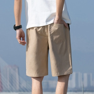 Men's khaki drawstring cargo shorts in washed cotton with a relaxed fit for summer