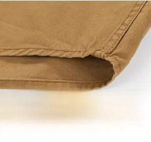 Detailed close-up showing fine stitching on the hem of this brown twill long sleeve shirt