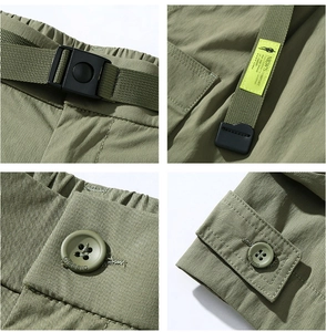 Vue détaillée du short cargo vert olive avec boucle de ceinture et étiquettes tissées