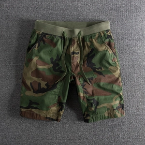 Men's washed camouflage cargo shorts with elastic drawstring waist and durable cotton fabric