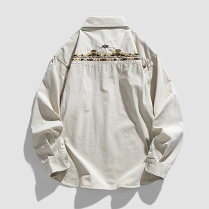 Men's beige long sleeve shirt featuring ethnic geometric embroidery on back shoulders