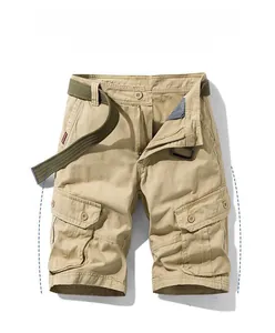 Detail of khaki cargo shorts showing heavy-duty side pockets and green canvas belt