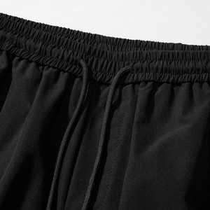 Men's black cargo shorts with elastic drawstring waist and premium synthetic fabric