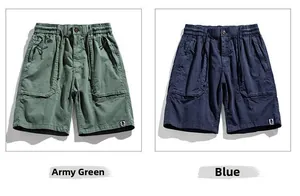Detail view of khaki and blue cargo shorts featuring side pockets and drawstring waist