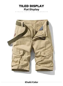 Detailed view of khaki cargo shorts with side flap pockets and army green woven belt