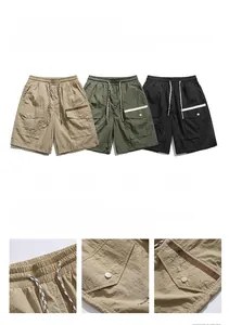 Detailed close-up of pocket stitching and drawstrings on cargo shorts for men