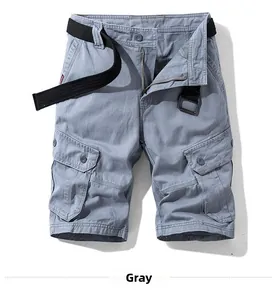 Detailed view of grey cargo shorts featuring side flap pockets and woven belt details