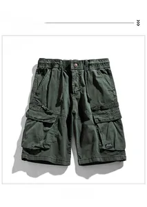 Detail of army green cargo shorts featuring elastic drawstring waist and large utility pockets