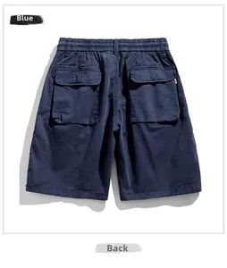 Close-up of blue cargo shorts back view featuring large flap pockets and elastic waist