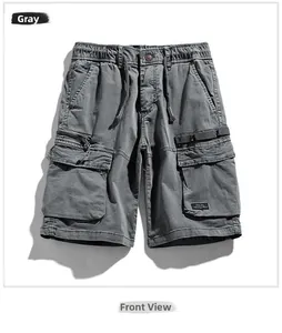 Detailed view of grey cargo shorts with elastic drawstring waist and side flap pockets