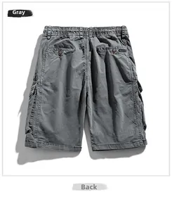 Detailed back view of dark grey cargo shorts featuring elastic waist and flap pockets