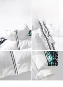 Detail view of white stand-collar puffer jacket featuring green patterned sleeve patchwork