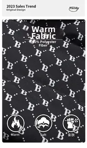 Detail of windproof polyester fabric with all-over B-pattern for warm winter jackets