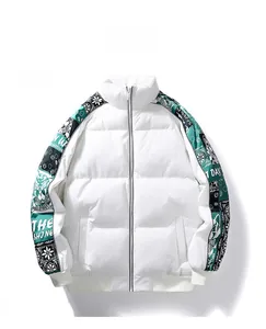 Detailed view of paisley print patchwork on the sleeve of a white puffer jacket