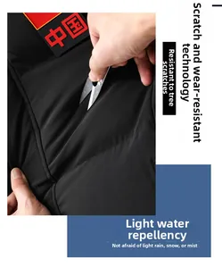 Detail of durable anti-scratch fabric and water-repellent texture of a long winter coat