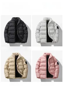 Winter puffer jacket detail showing B-monogram pattern in black, white, khaki, and pink