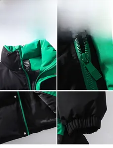 Detail of windproof elastic cuffs and green plastic zipper on a two-tone puffer jacket