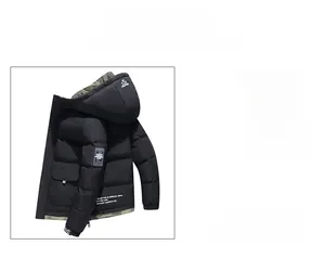 Detail of black hooded winter jacket for men featuring camouflage lining and stylish patches