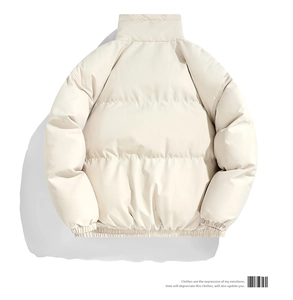 Back view of minimalist cream puffer jacket with stand collar and quilted texture