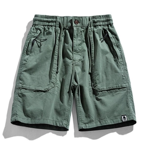Japanese style sage green cargo shorts with elastic waist and large side pockets