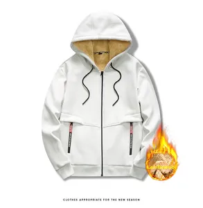 Detail showing thick lamb wool lining in white hooded sweatshirt for winter warmth